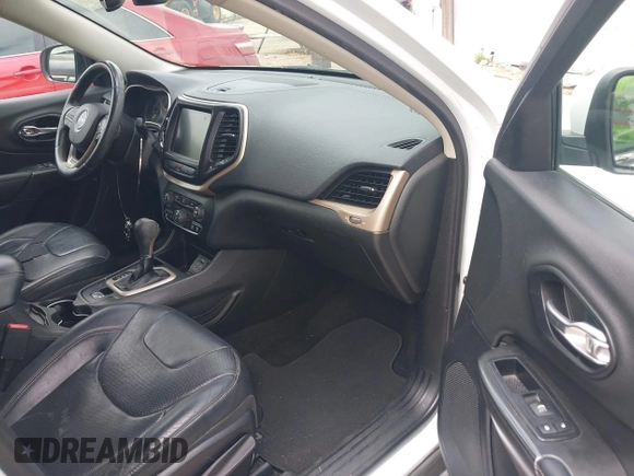 2014 Jeep Cherokee Limited with VIN 1C4PJLDB2EW173127, listed as a IAAI auction lot 42413180 with 107,871 mi miles and . Bid and sale history available at DreamBid. Image 5.