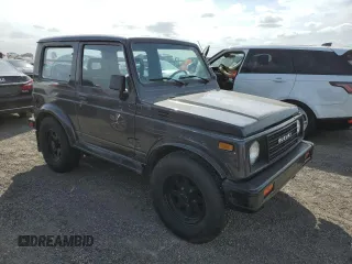 1986 Suzuki Samurai z VIN JS3JC51V8G4110639, wystawiony jako Copart lot #75466894 z przebiegiem Nie podano mil oraz Szkody całkowita. Historia ofert i sprzedaży dostępna na DreamBid. Obrazek 4.