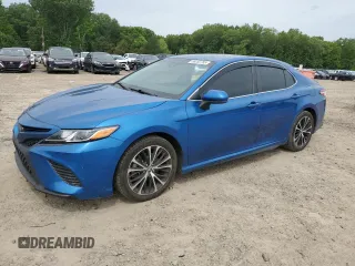 2020 Toyota Camry SE z VIN 4T1G11AKXLU371418, wystawiony jako Copart lot #56050785 z przebiegiem 106 183 mil mil oraz Szkoda całkowita • Salvage title. Historia ofert i sprzedaży dostępna na DreamBid. Obrazek 1.