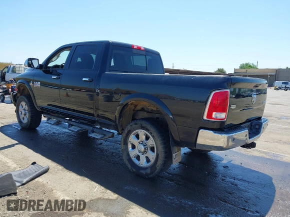2015 Ram 2500 Laramie with VIN 3C6UR5FL4FG651469, listed as a IAAI auction lot 42179544 with 190,222 mi miles and . Bid and sale history available at DreamBid. Image 3.