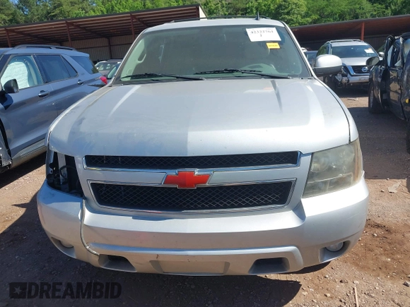 2014 Chevrolet Tahoe LT with VIN 1GNSCBE00ER147899, listed as a IAAI auction lot 42322761 with 299,342 mi miles and . Bid and sale history available at DreamBid. Image 6.