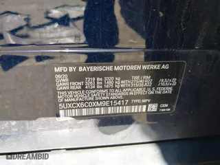 2021 BMW X7 M50i with VIN 5UXCX6C0XM9E15417, listed as a IAAI auction lot 41402910 with 70,768 mi miles. Bid and sale history available at carsss.com. Image 9.