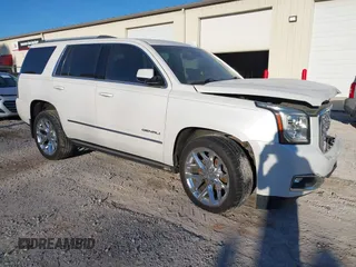 2018 GMC Yukon Denali with VIN 1GKS2CKJ4JR218924, listed as a IAAI auction lot 41702225 with 114,719 mi miles. Bid and sale history available at carsss.com. Image 1.