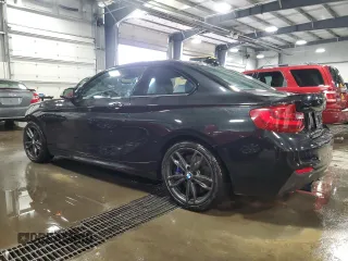 2016 BMW 2 Series M235i xDrive with VIN WBA1J9C5XGV695823, listed as a Copart auction lot 81548364 with 83,149 mi miles and Salvage Title. Bid and sale history available at carsss.com. Image 2.