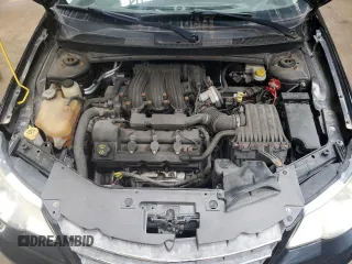 2009 Chrysler Sebring Touring z VIN 1C3LC56D69N570746, wystawiony jako Copart lot #55300405 z przebiegiem 186 391 mil mil oraz Czysty tytuł • Clean title. Historia ofert i sprzedaży dostępna na DreamBid. Obrazek 11.