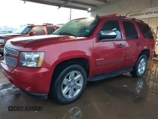 2013 Chevrolet Tahoe LS with VIN 1GNSCAE09DR171918, listed as a IAAI auction lot 41573324 with 175,935 mi miles and . Bid and sale history available at DreamBid. Image 2.