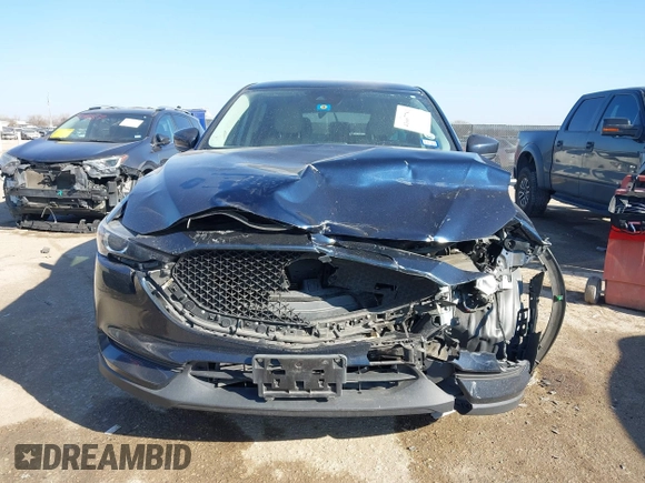2017 Mazda CX-5 Touring with VIN JM3KFACL1H0192549, listed as a IAAI auction lot 41667781 with 89,030 mi miles. Bid and sale history available at carsss.com. Image 12.