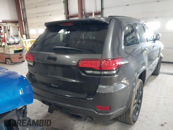 2018 Jeep Grand Cherokee Laredo E with VIN 1C4RJFAG5JC343101, listed as a IAAI auction lot 41211158 with 105,886 mi miles. Bid and sale history available at carsss.com. Image 16.