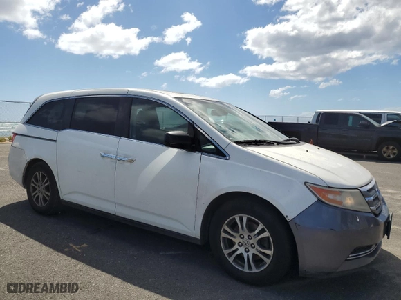 2012 Honda Odyssey EX-L with VIN 5FNRL5H69CB051748, listed as a Copart auction lot 46780975 with 170,289 mi miles and Salvage Title. Bid and sale history available at carsss.com. Image 4.