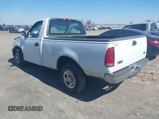 2002 Ford F-150 XL with VIN 1FTRF172X2NC07830, listed as a IAAI auction lot 41584706 with 143,255 mi miles. Bid and sale history available at carsss.com. Image 3.