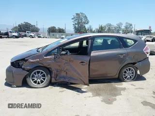 2015 Toyota Prius Two with VIN JTDZN3EU8FJ028072, listed as a IAAI auction lot 39747470 with 62,979 mi miles and . Bid and sale history available at DreamBid. Image 15.