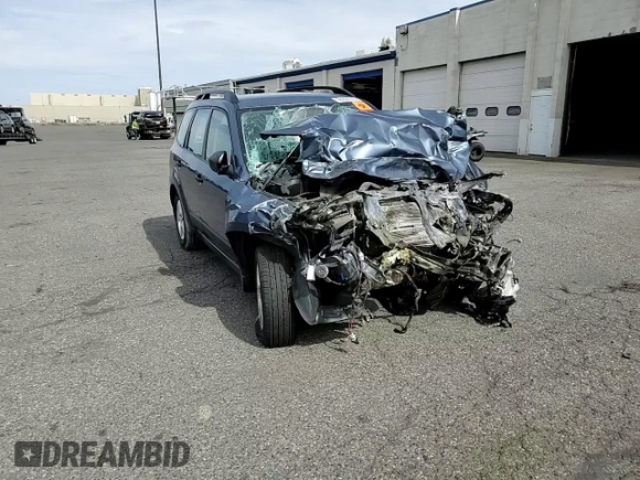 2011 Subaru Forester X z VIN JF2SHABC0BH717387, wystawiony jako Copart lot #56250145 z przebiegiem Nie podano mil oraz Szkoda całkowita • Salvage title. Historia ofert i sprzedaży dostępna na DreamBid. Obrazek 14.
