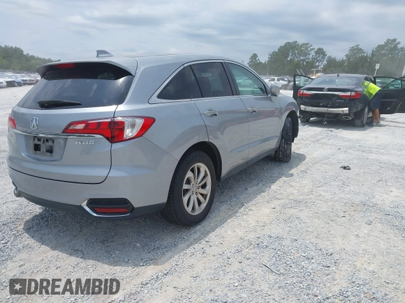 2018 Acura RDX with VIN 5J8TB3H33JL001314, listed as a IAAI auction lot 42320942 with 61,206 mi miles and . Bid and sale history available at DreamBid. Image 4.