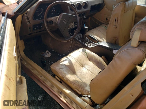 1981 Datsun 280ZX 2+2 z VIN JN1HZ06S6BX193317, wystawiony jako Copart lot #75494384 z przebiegiem 78 678 mil mil oraz Szkody całkowita. Historia ofert i sprzedaży dostępna na DreamBid. Obrazek 8.