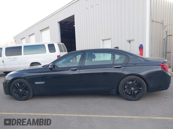 2015 BMW 7 Series 750Li xDrive with VIN WBAYF8C55FD654949, listed as a IAAI auction lot 41659763 with 91,837 mi miles and . Bid and sale history available at carsss.com. Image 14.