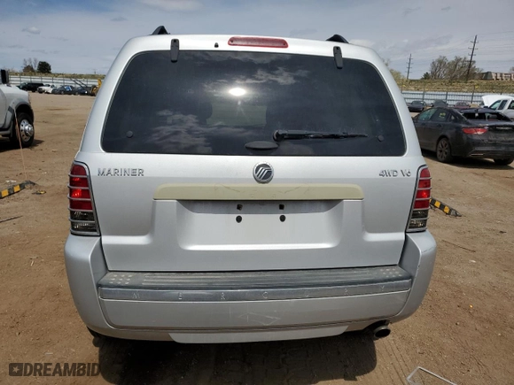 2007 Mercury Mariner Luxury with VIN 4M2YU91117KJ02032, listed as a Copart auction lot 50418815 with 128,498 mi miles and Salvage Title. Bid and sale history available at carsss.com. Image 6.