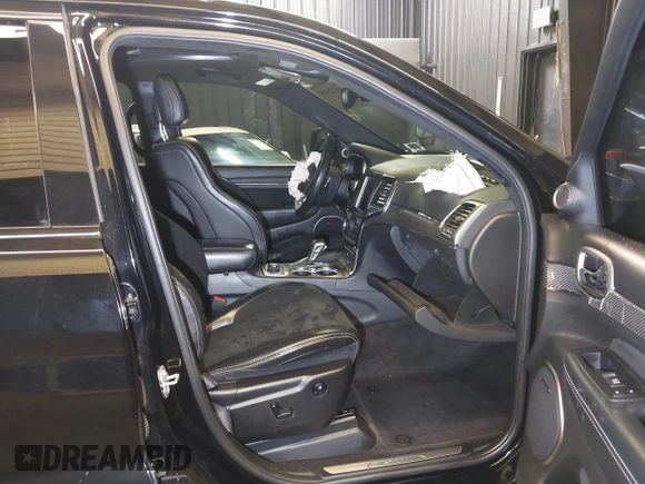 2017 Jeep Grand Cherokee SRT with VIN 1C4RJFDJ9HC819478, listed as a IAAI auction lot 41325490 with 63,551 mi miles. Bid and sale history available at carsss.com. Image 5.