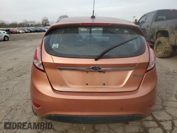 2017 Ford Fiesta Titanium with VIN 3FADP4FJ8HM164132, listed as a Copart auction lot 82577424 with 63,686 mi miles and Salvage Title. Bid and sale history available at DreamBid. Image 6.