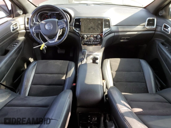2020 Jeep Grand Cherokee Laredo E with VIN 1C4RJEAG2LC379633, listed as a Copart auction lot 58437555 with 57,219 mi miles and Salvage title. Bid and sale history available at DreamBid. Image 8.