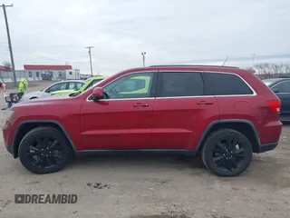 2013 Jeep Grand Cherokee Laredo with VIN 1C4RJEAG4DC573971, listed as a IAAI auction lot 41627288 with 143,256 mi miles. Bid and sale history available at carsss.com. Image 14.