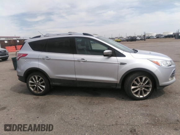 2016 Ford Escape SE with VIN 1FMCU9G91GUA29242, listed as a IAAI auction lot 42099898 with 125,330 mi miles. Bid and sale history available at carsss.com. Image 13.