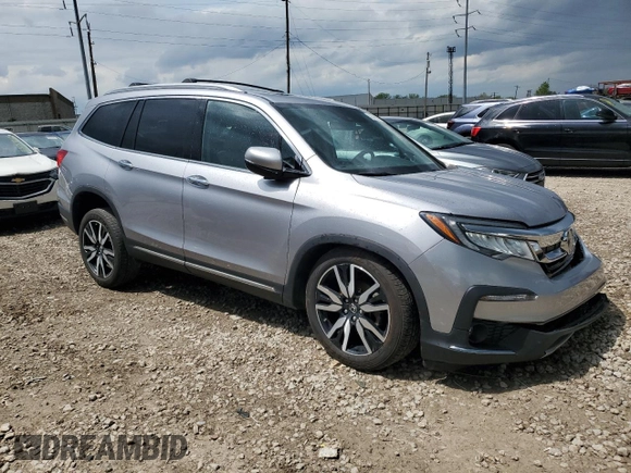 2022 Honda Pilot Touring 7-Passenger with VIN 5FNYF6H69NB019572, listed as a Copart auction lot 55446895 with 82,424 mi miles and Salvage title. Bid and sale history available at DreamBid. Image 4.
