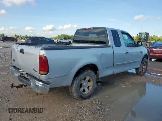 2000 Ford F-150 XL с VIN 1FTRX17L6YKB45245, выставлен на аукционе Copart как лот 62365195 с пробегом 306 210 миль миль и Списание • Salvage title. История ставок и продаж доступна на DreamBid. Изображение 3.