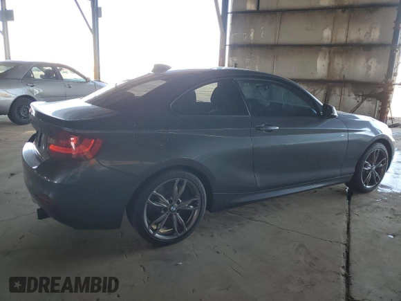 2015 BMW 2 Series M235i with VIN WBA1J7C59FV253506, listed as a Copart auction lot 49506005 with 73,628 mi miles and Clean Title. Bid and sale history available at carsss.com. Image 3.