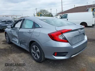 2020 Honda Civic LX with VIN 2HGFC2F65LH544133, listed as a IAAI auction lot 42148441 with 49,063 mi miles and . Bid and sale history available at DreamBid. Image 3.