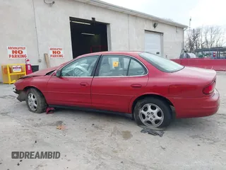 1998 Oldsmobile Intrigue GL z VIN 1G3WS52K5WF349905, wystawiony jako IAAI lot #41724041 z przebiegiem Nie podano mil oraz . Historia ofert i sprzedaży dostępna na DreamBid. Obrazek 14.