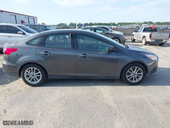 2018 Ford Focus SE with VIN 1FADP3F24JL207231, listed as a IAAI auction lot 42024366 with 134,446 mi miles. Bid and sale history available at carsss.com. Image 13.