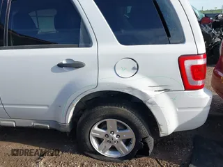 2009 Ford Escape Hybrid with VIN 1FMCU49399KC19803, listed as a IAAI auction lot 42004776 with 163,353 mi miles and . Bid and sale history available at DreamBid. Image 6.