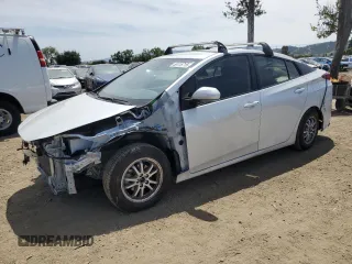 2022 Toyota Prius L Eco z VIN JTDKAMFUXN3182996, wystawiony jako Copart lot #55115715 z przebiegiem 68 061 mil mil oraz Szkoda całkowita • Salvage title. Historia ofert i sprzedaży dostępna na DreamBid. Obrazek 1.
