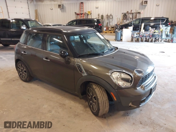 2011 MINI Countryman S z VIN WMWZC3C54BWL78942, wystawiony jako IAAI lot #42345296 z przebiegiem 158 202 mil mil oraz . Historia ofert i sprzedaży dostępna na DreamBid. Obrazek 1.
