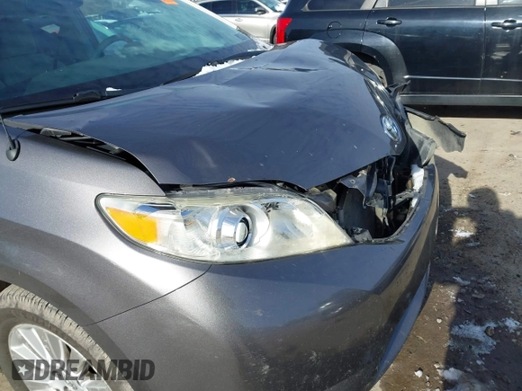 2013 Toyota Sienna LE with VIN 5TDJK3DC8DS056730, listed as a IAAI auction lot 41141247 with 166,579 mi miles and . Bid and sale history available at DreamBid. Image 19.