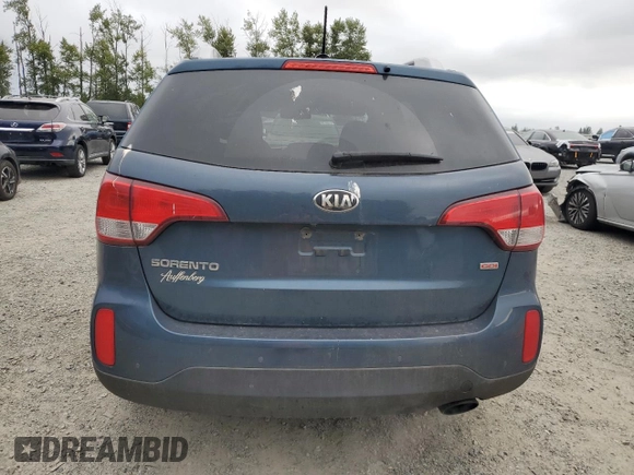 2014 Kia Sorento LX z VIN 5XYKT4A6XEG509539, wystawiony jako Copart lot #60670185 z przebiegiem 164 919 mil mil oraz Czysty tytuł • Clean title. Historia ofert i sprzedaży dostępna na DreamBid. Obrazek 6.