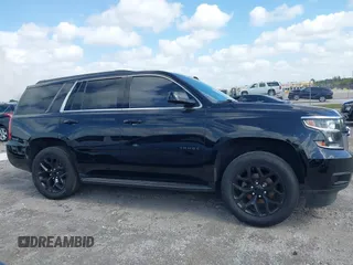 2017 Chevrolet Tahoe LS with VIN 1GNSCAKC1HR225698, listed as a IAAI auction lot 42044712 with 89,605 mi miles and . Bid and sale history available at DreamBid. Image 13.