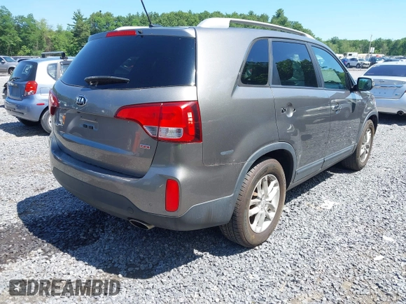 2015 Kia Sorento LX with VIN 5XYKTCA67FG585974, listed as a IAAI auction lot 42648014 with 106,193 mi miles and . Bid and sale history available at DreamBid. Image 4.