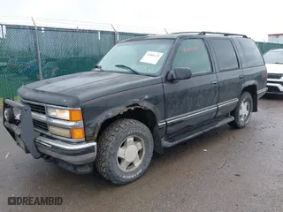 1999 Chevrolet Tahoe Z71 with VIN 1GNEK13R9XJ515820, listed as a IAAI auction lot 42004125 with 251,184 mi miles. Bid and sale history available at carsss.com. Image 2.