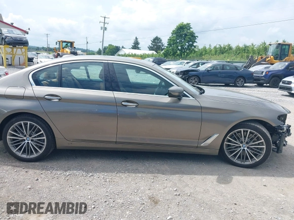 2018 BMW 5 Series 530i xDrive with VIN WBAJA7C55JG909519, listed as a IAAI auction lot 42650263 with 57,077 mi miles and . Bid and sale history available at DreamBid. Image 13.