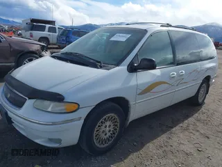 1997 Chrysler Town & Country with VIN 1C4GT64L7VB436658, listed as a IAAI auction lot 41823587 with 184,570 mi miles and . Bid and sale history available at DreamBid. Image 2.