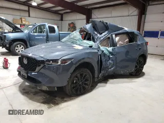 2024 Mazda CX-5 2.5 S Preferred Package with VIN JM3KFBCL9R0502891, listed as a Copart auction lot 52292185 with 10,595 mi miles and Salvage Title. Bid and sale history available at carsss.com. Image 1.