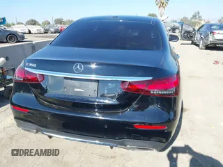 2021 Mercedes-Benz E-Class E 350 with VIN W1KZF8DB0MA889890, listed as a IAAI auction lot 41317094 with 63,075 mi miles. Bid and sale history available at carsss.com. Image 16.