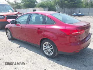 2017 Ford Focus SE z VIN 1FADP3F26HL305624, wystawiony jako IAAI lot #42411111 z przebiegiem 58 865 mil mil oraz . Historia ofert i sprzedaży dostępna na DreamBid. Obrazek 3.
