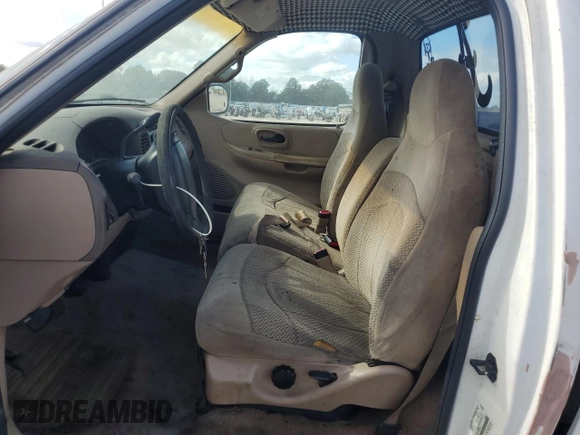 1999 Ford F-150 z VIN 1FTRF17W9XNB67119, wystawiony jako Copart lot #79197414 z przebiegiem Nie podano mil oraz Szkoda całkowita • Salvage title. Historia ofert i sprzedaży dostępna na DreamBid. Obrazek 7.