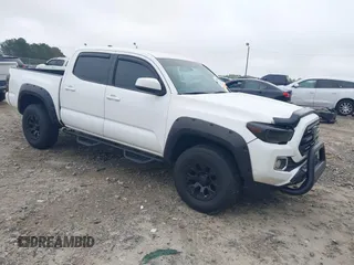 2018 Toyota Tacoma SR z VIN 5TFAX5GN1JX130019, wystawiony jako IAAI lot #41827460 z przebiegiem 114 340 mil mil oraz . Historia ofert i sprzedaży dostępna na DreamBid. Obrazek 1.