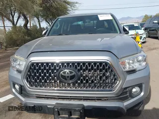 2020 Toyota Tacoma SR5 with VIN 3TMCZ5AN1LM324828, listed as a IAAI auction lot 40977362 with 33,906 mi miles and . Bid and sale history available at DreamBid. Image 12.