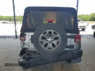 2017 Jeep Wrangler Unlimited Rubicon with VIN 1C4BJWFG4HL677477, listed as a Copart auction lot 57758175 with 89,584 mi miles and Salvage title. Bid and sale history available at DreamBid. Image 6.