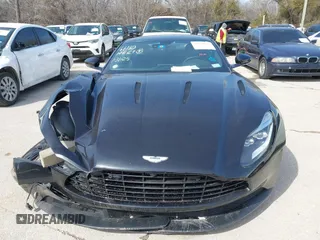 2018 Aston Martin DB11 z VIN SCFRMFAV5JGL04914, wystawiony jako IAAI lot #41538145 z przebiegiem 40 703 mil mil oraz . Historia ofert i sprzedaży dostępna na DreamBid. Obrazek 12.