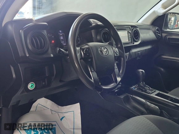 2019 Toyota Tacoma SR with VIN 5TFRX5GN1KX143485, listed as a IAAI auction lot 42763045 with 90,847 mi miles and . Bid and sale history available at DreamBid. Image 4.